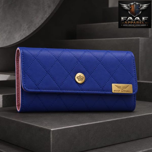 royal blue quilted long wallet featuring a gold crown snap closure and branded hardware.